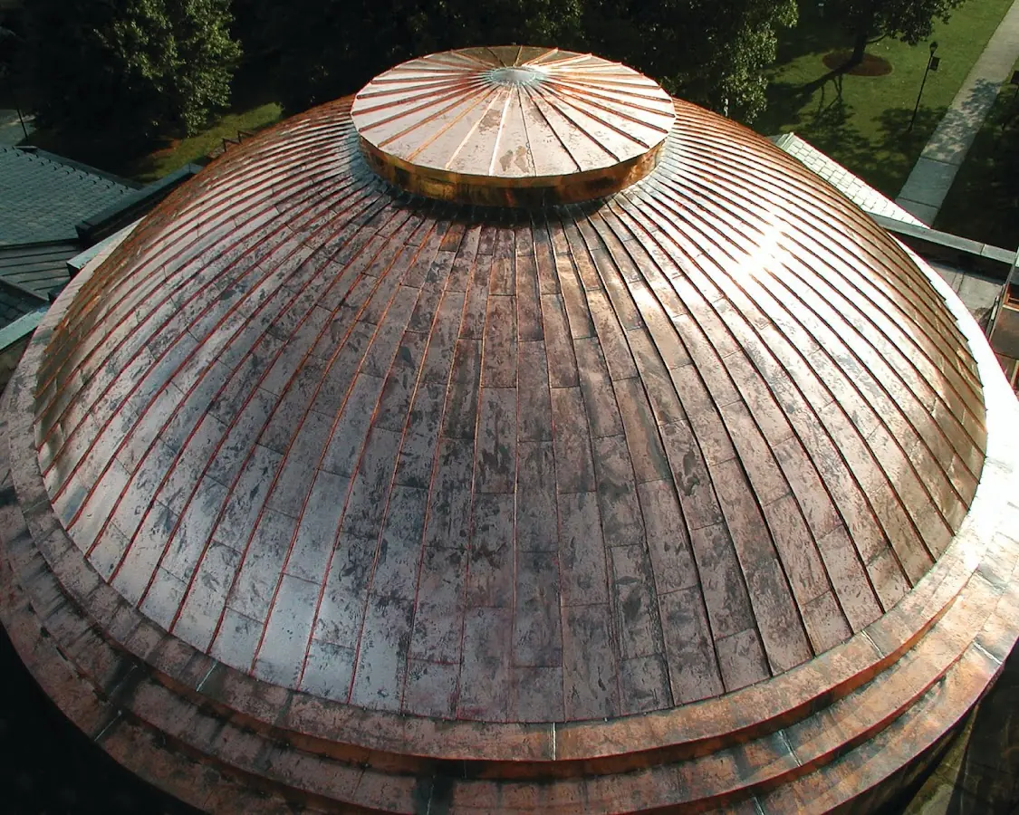 Craftsman Roofing crew installing a new roof in Wynnewood